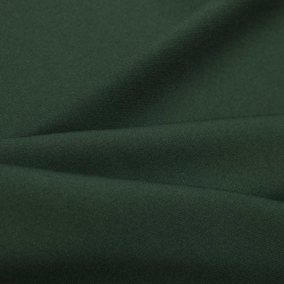 Ткань костюмная 21010 2076, 225 гр/м2, шир.150см, цвет т.зеленый - купить в Ухте. Цена 390.73 руб.